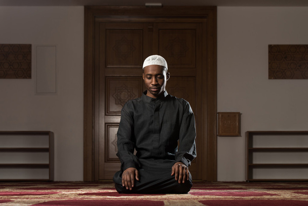 African Muslim Man Is Praying In The Mosque - Фото, изображение