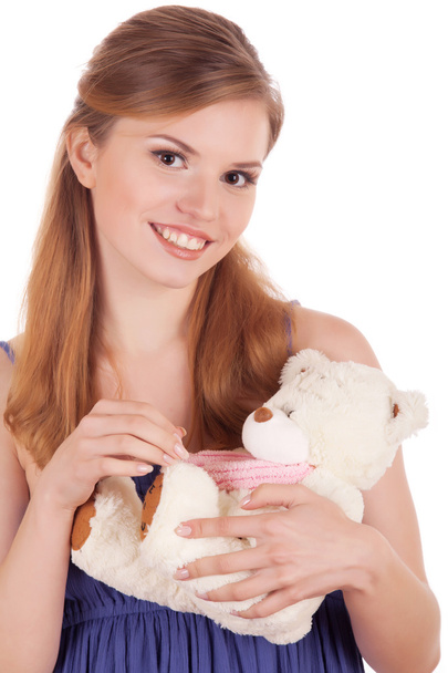 elinde oyuncak ayı ile gülümseyen kız - Fotoğraf, Görsel