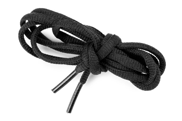Чорні шнурки на білому тлі - Фото, зображення