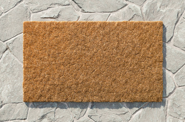 Overhead of blank doormat on the rock tile porch. - Photo, Image