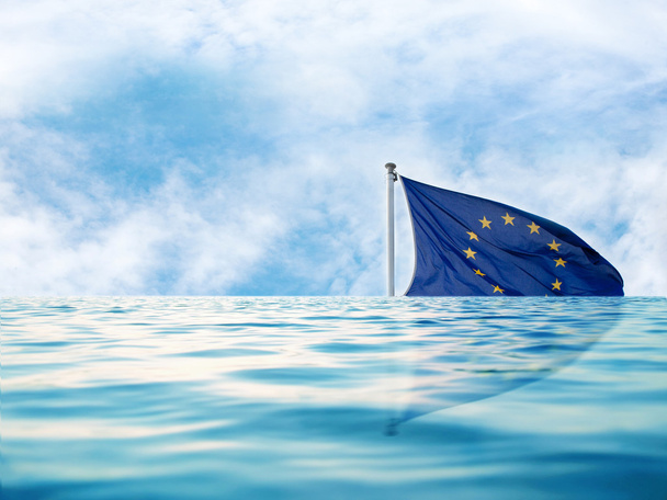 Europe flag in water with blue sky, as a symbol of crisis - Photo, Image