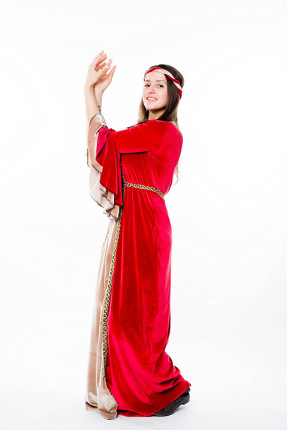 Woman in red Renaissance Costume. Fairy Velvet Irish Dress - Φωτογραφία, εικόνα