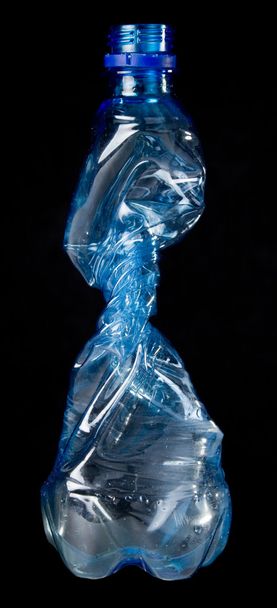 Silhouette of a crumpled plastic bottles - Foto, afbeelding
