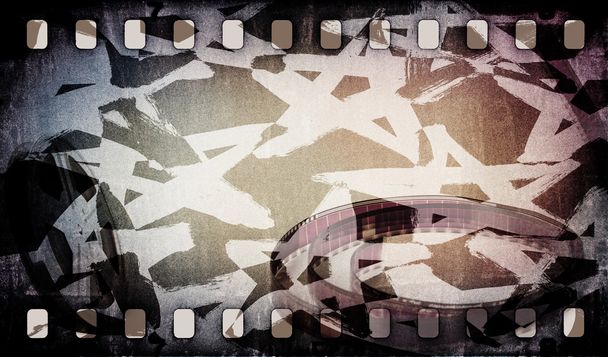 Motion picture film reel with strip and stars background - Photo, Image