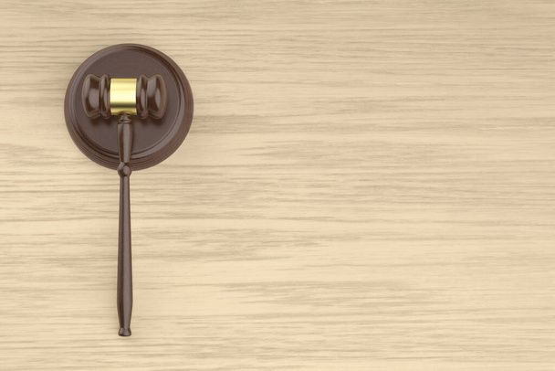 Wooden gavel on the wooden desk, top view - Photo, Image