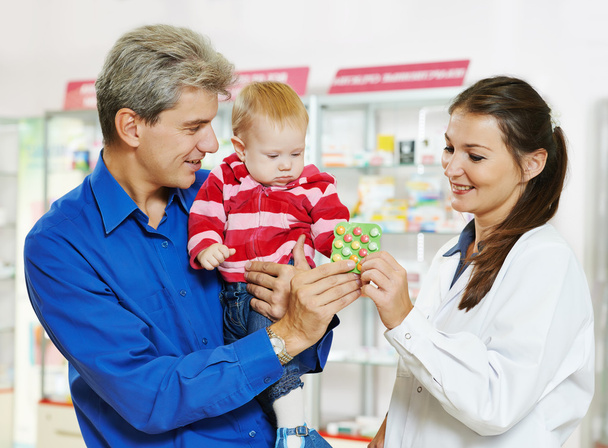 Pharmacy chemist, father and baby in drugstore - Zdjęcie, obraz