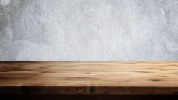 Tavolo in legno vuoto con sfondo in cemento astratto per esposizione e presentazione del prodotto - Foto, immagini