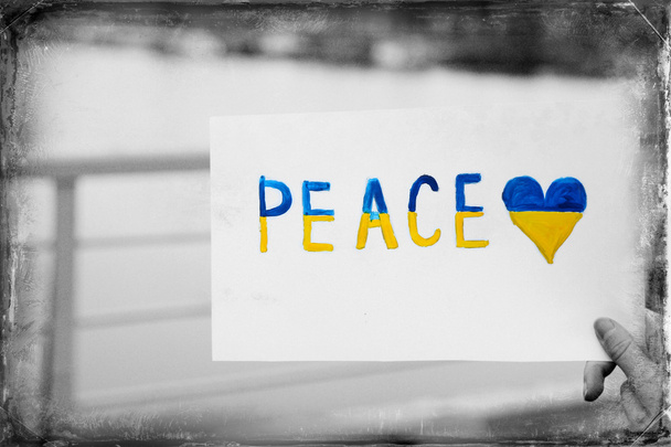 Hand holding paper with Peace of Ukraine - Fotoğraf, Görsel