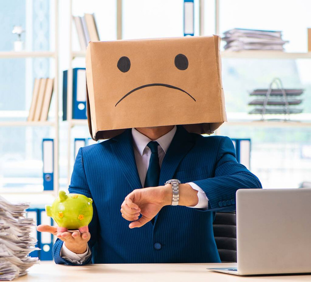 The unhappy man with box instead of his head - Photo, Image