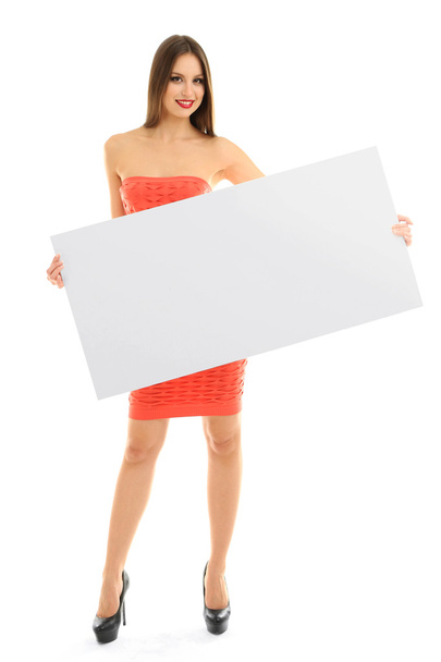 Prachtige model in jurk met lege poster geïsoleerd op wit - Foto, afbeelding