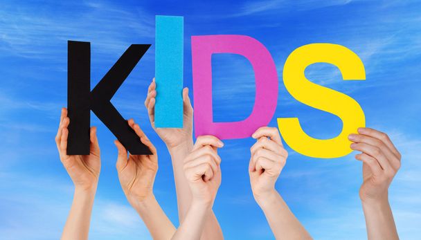 Many People Hands Holding Colorful Word Kids Blue Sky - Foto, imagen
