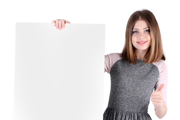 Beautiful young woman holding blank poster isolated on white - Foto, afbeelding