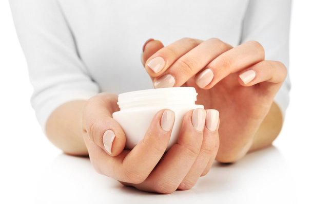 Female hands holding jar of cream isolated on white - Photo, image