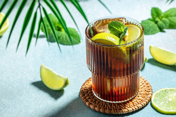 Cuba Libre with Lime and Ice mint in the glass. top view. place for text. - Photo, Image