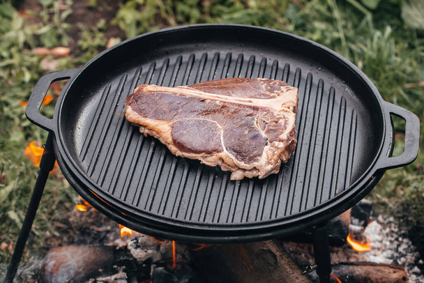 Beef steaks on the grill. banner, menu, recipe place for text, top view. - Photo, Image