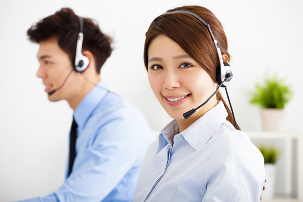  businesswoman and businessman with headset working in office - Photo, Image