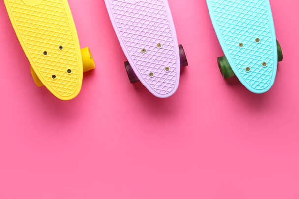 Set of skateboards on pink background - Photo, Image