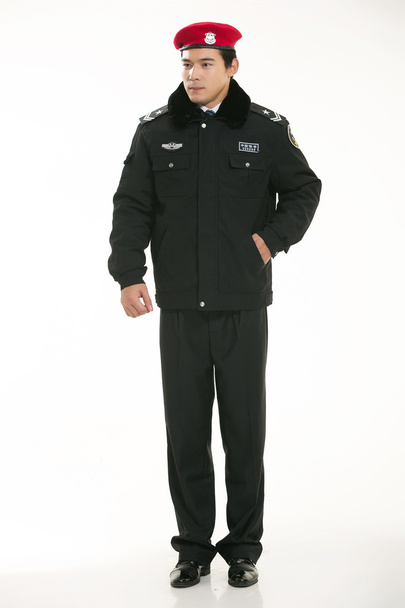 Criar todos os tipos de roupas de trabalho policial fica na frente de um fundo branco - Foto, Imagem