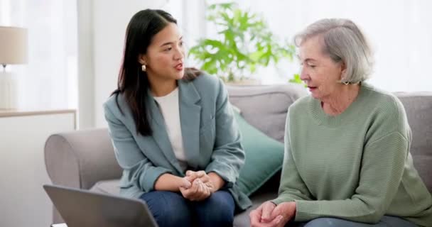 Communication, woman and senior with laptop for life insurance, mortgage loan or retirement investment on sofa in home. Accounting, people and advice on financial budget for asset management or tax. - Footage, Video