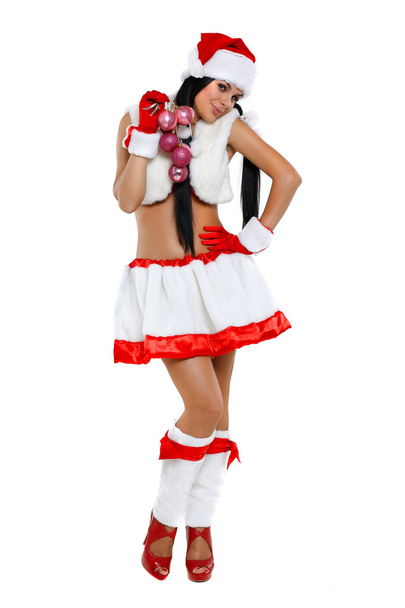 Beautiful and sexy woman wearing santa clause costume - 写真・画像