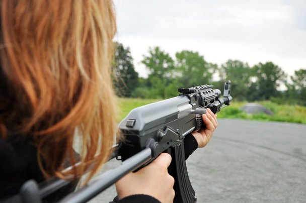 woman with gun - Photo, Image