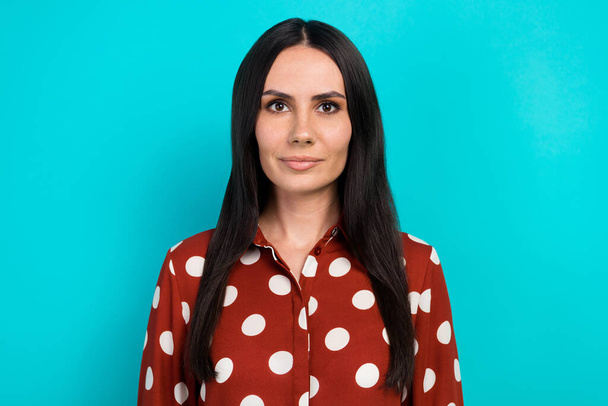 Photo of confident businesswoman brunette hair wear red dotted shirt serious entrepreneur charming lady isolated over blue color background. - Fotó, kép