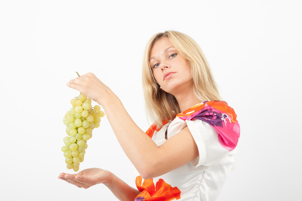 Eva holding grapes - Valokuva, kuva