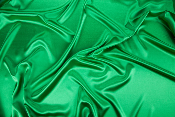 Green silk background. - Foto, afbeelding