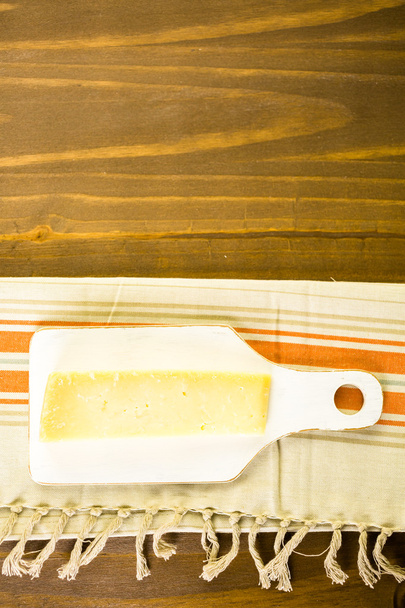 Rebanada de queso parmesano
 - Foto, Imagen
