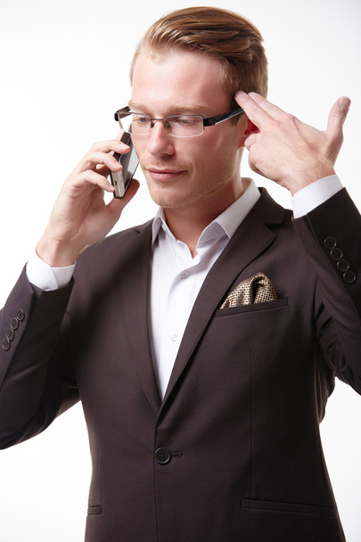 shocked businessman with phone - Foto, afbeelding