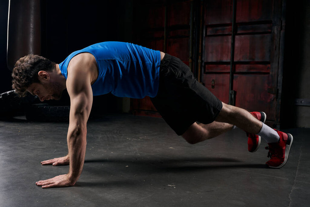 full length of resilient man in sportswear training in plank pose in night city, street workout - Φωτογραφία, εικόνα