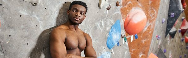 handsome african american man with his arms crossed on chest posing with his shirt off, banner - Photo, Image