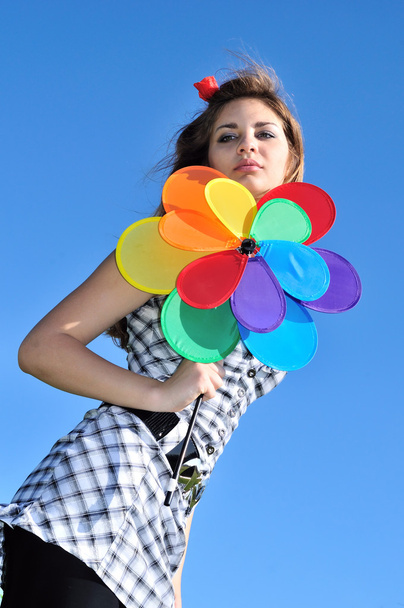Girl holding windmill - Valokuva, kuva