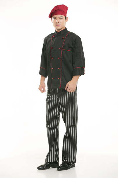 Usando todo tipo de ropa de chef dietista en frente de fondo blanco - Foto, Imagen