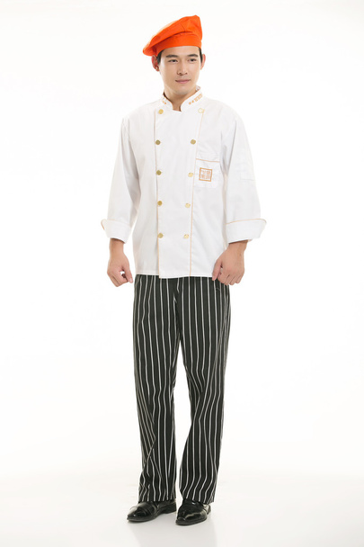 Носіння всілякого одягу шеф-кухаря дієтолога перед білим тлом
 - Фото, зображення