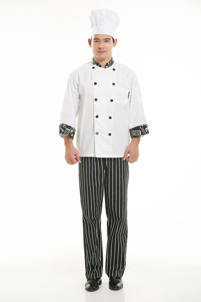 Usando todo tipo de ropa de chef dietista en frente de fondo blanco - Foto, imagen