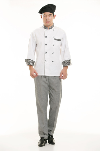 Porter toutes sortes de vêtements chef diététiste en face de fond blanc - Photo, image