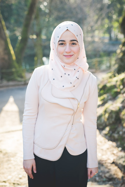 young beautiful muslim woman at the park - Fotó, kép
