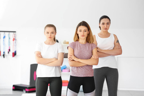 Portrait of young women in gym. Concept of self defense courses - Photo, Image