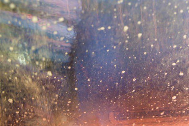 Abstrakti veden heijastus taustasta
 - Valokuva, kuva
