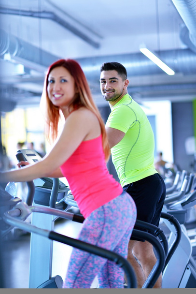 Young man and woman working out - Photo, Image