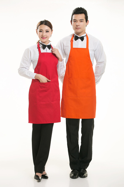 Nosić wszelkiego rodzaju fartuch kelner stojący w białym tle - Zdjęcie, obraz