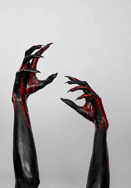 Bloody black hands of death - Photo, image
