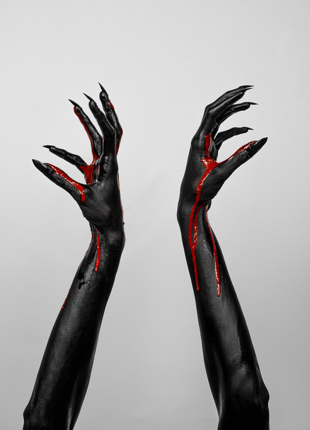 Bloody black hands of death - Foto, Imagen