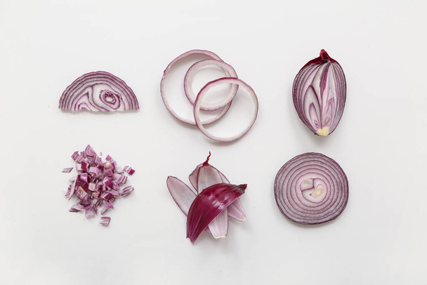 Slices of fresh red onion on white background - Photo, Image
