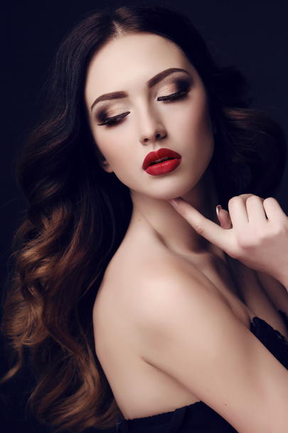 beautiful sexy woman with dark hair and bright makeup   - Valokuva, kuva