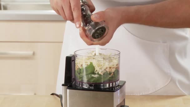 Pesto ingredients in a mixer - Footage, Video