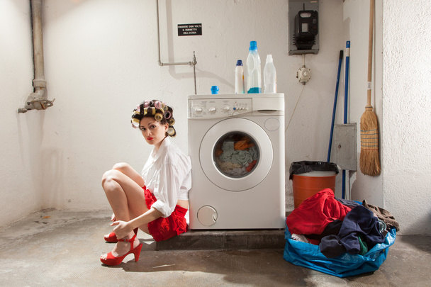 housewife bored in the laundry - Foto, Bild