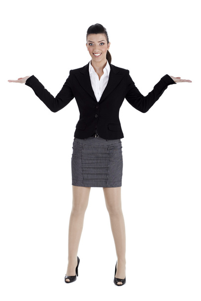Beautiful business woman streching both the hands and pointing empty space - Φωτογραφία, εικόνα