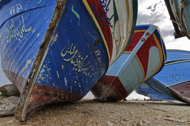 Old wooden fishing boats ashore - Photo, Image